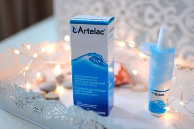 Упаковка и флакон глазных капель артелак
